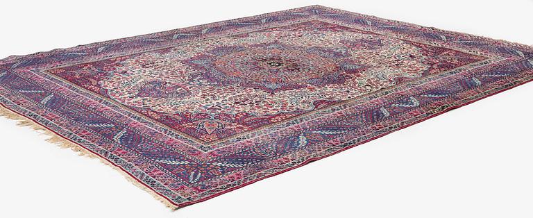 A semi-antique Kirman carpet, South Persia, c. 380 x 289 cm.