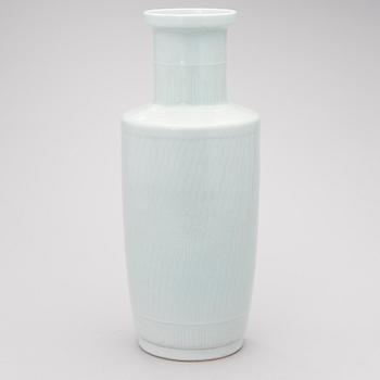 A light-green glazed ceramic vase.