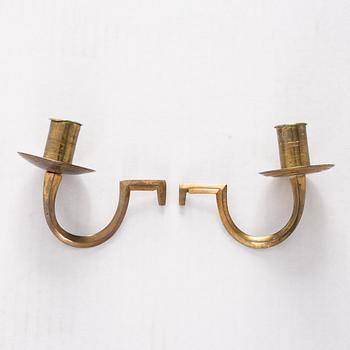 A pair of Swedish Empire mirror wall sconces, first half of the 19th century.