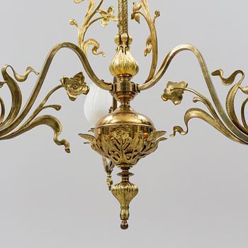 A brass art noveau ceiling lamp, early 20th Century.