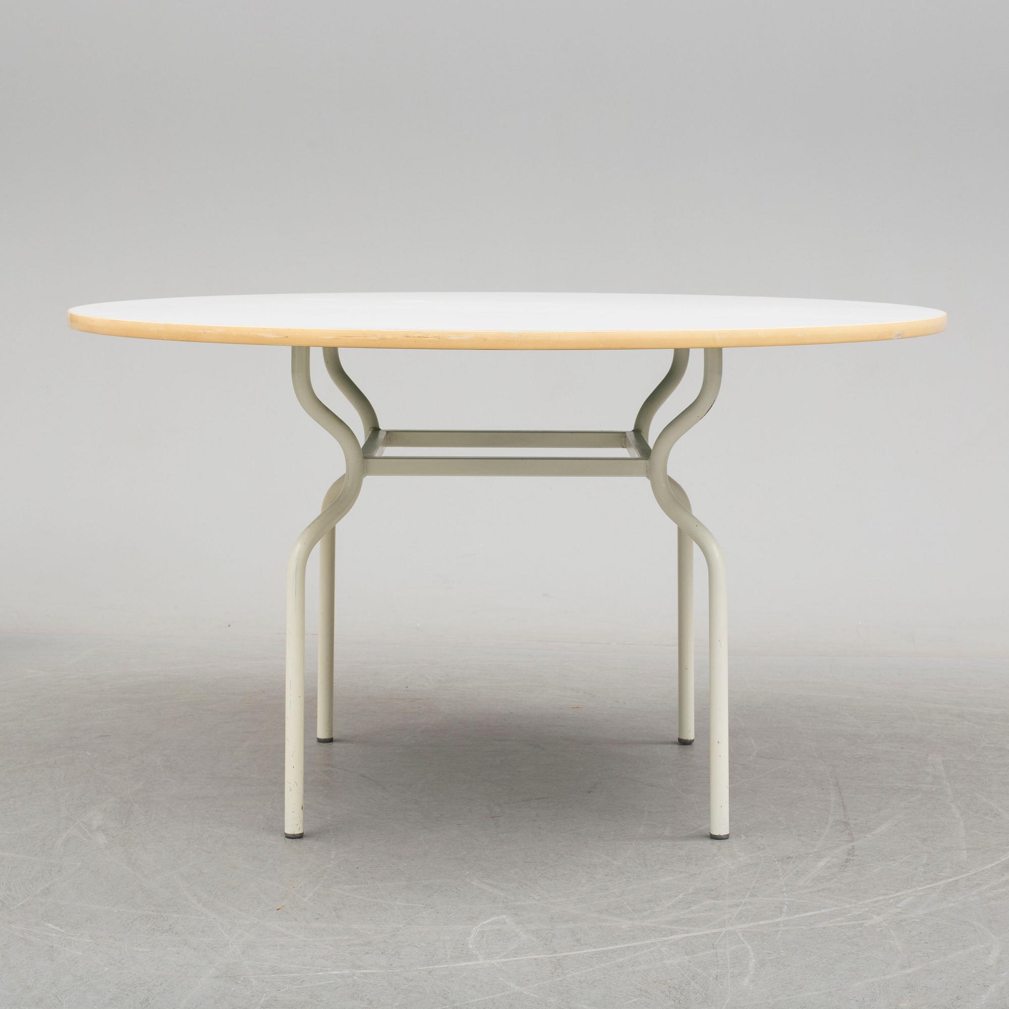 a dining table with four chairs by Sigurd Persson, latter part of 20th century.