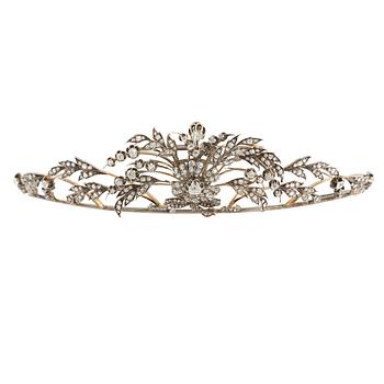 A brooch/tiara combination.