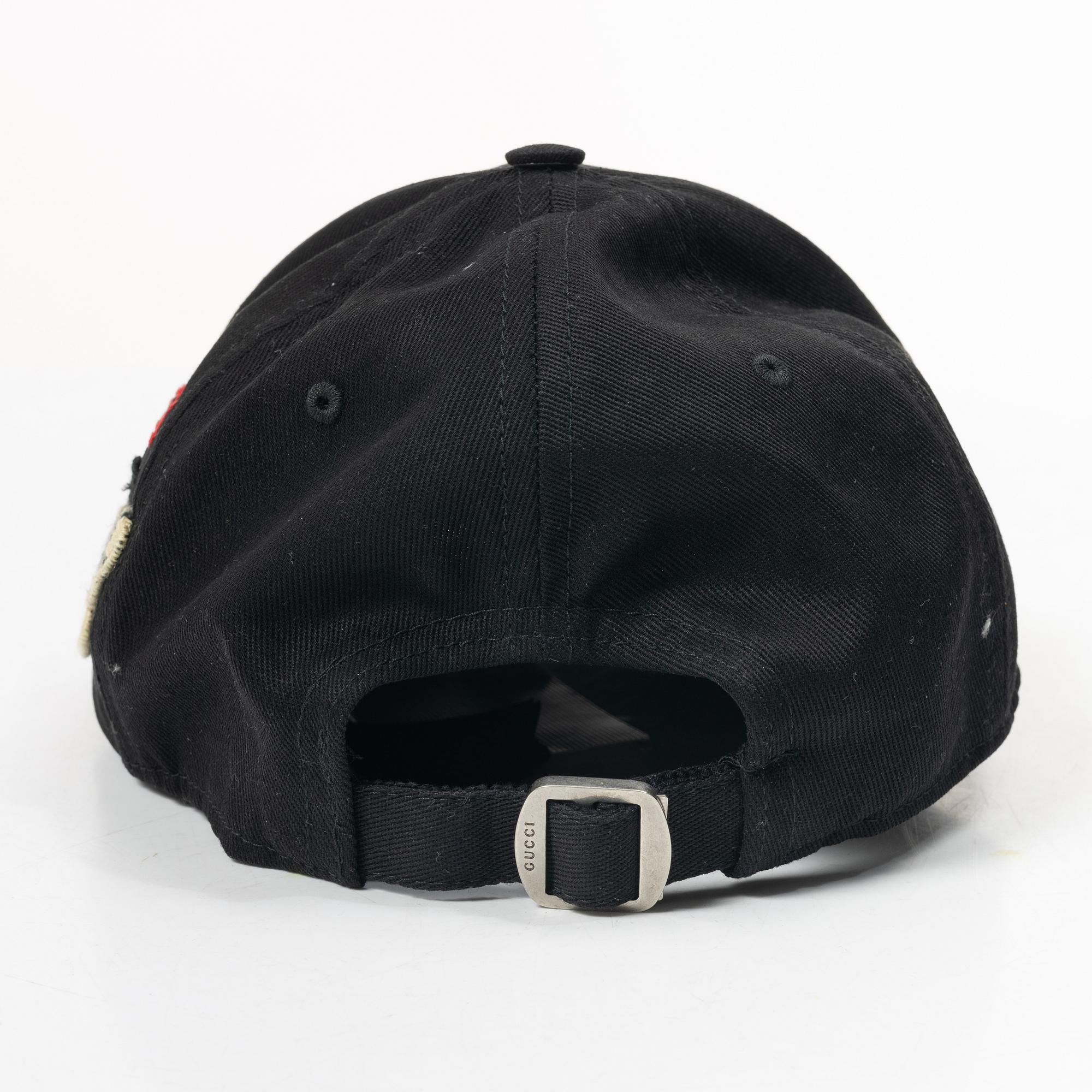 Gucci, NY Yankees baseball cap.