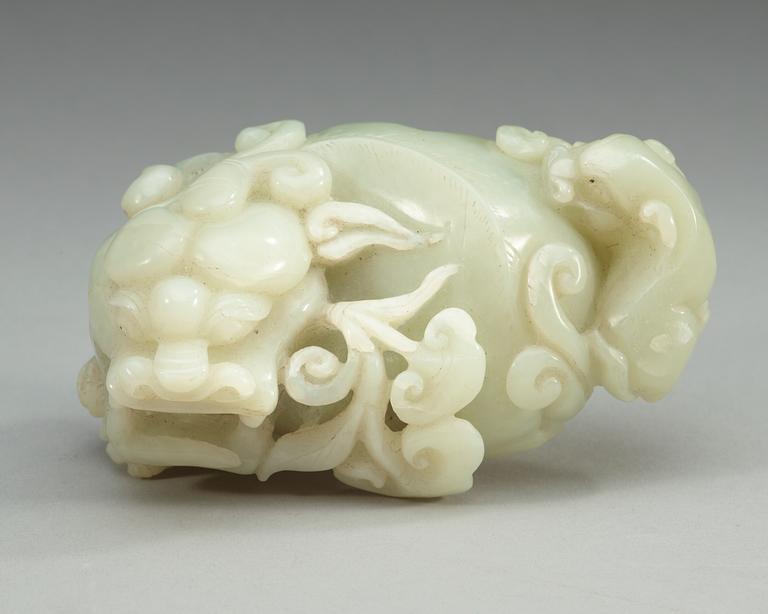 A Chinese nephrite figure of two buddhist lions.