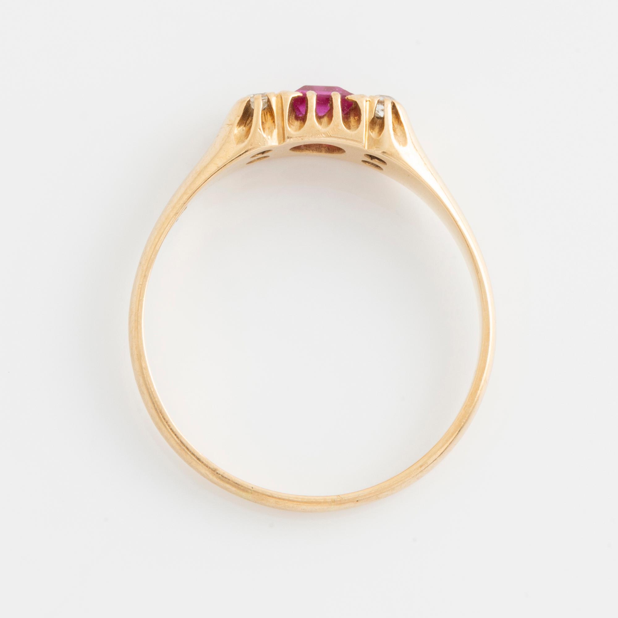 Ring, gold with synthetic pink stone and small white stones.