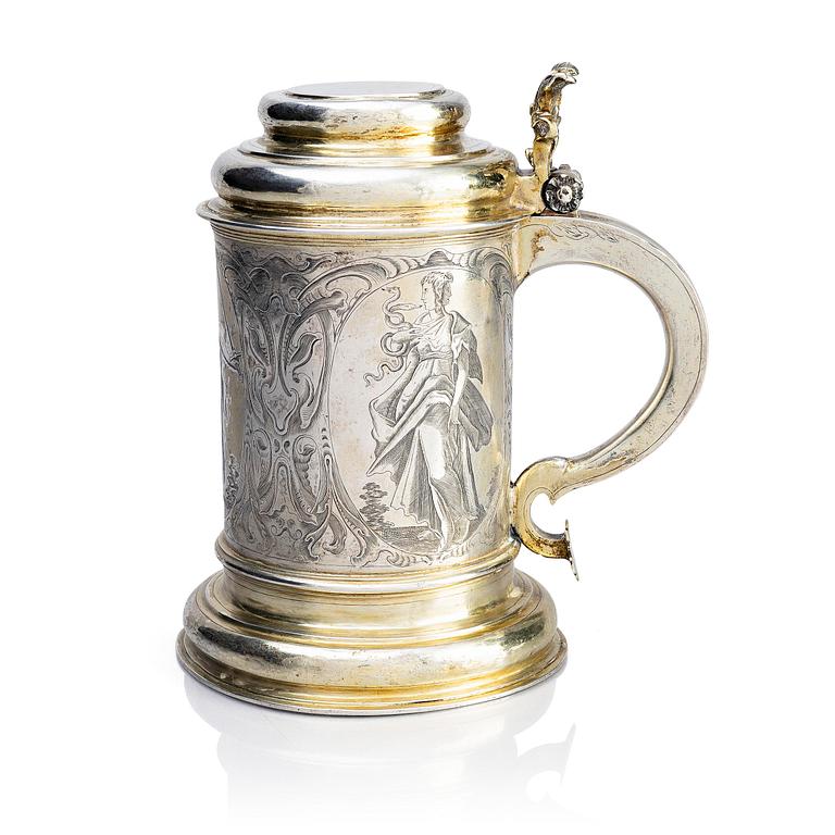 A German parcel-gilt silver tankard, mark of Walter Kopman, Hamburg (1649-1688).