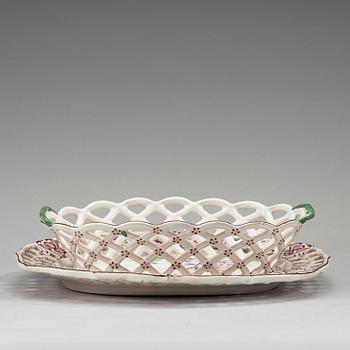 A Strassbourg faience chesnut basket and stand, period of Joseph Hannong, 18th Century.