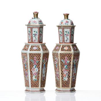 A pair of famille rose vases with covers, Qing dynasty, Qianlong (1736-95).