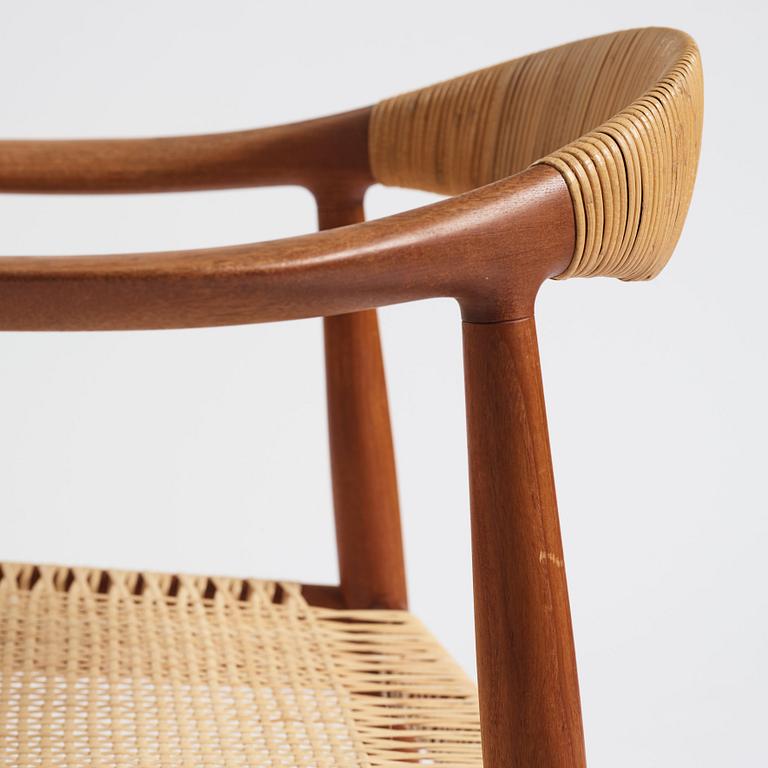 Hans J. Wegner, a pair of teak and rattan 'The Chair', JH-503, Johannes Hansen, Denmark 1950s.