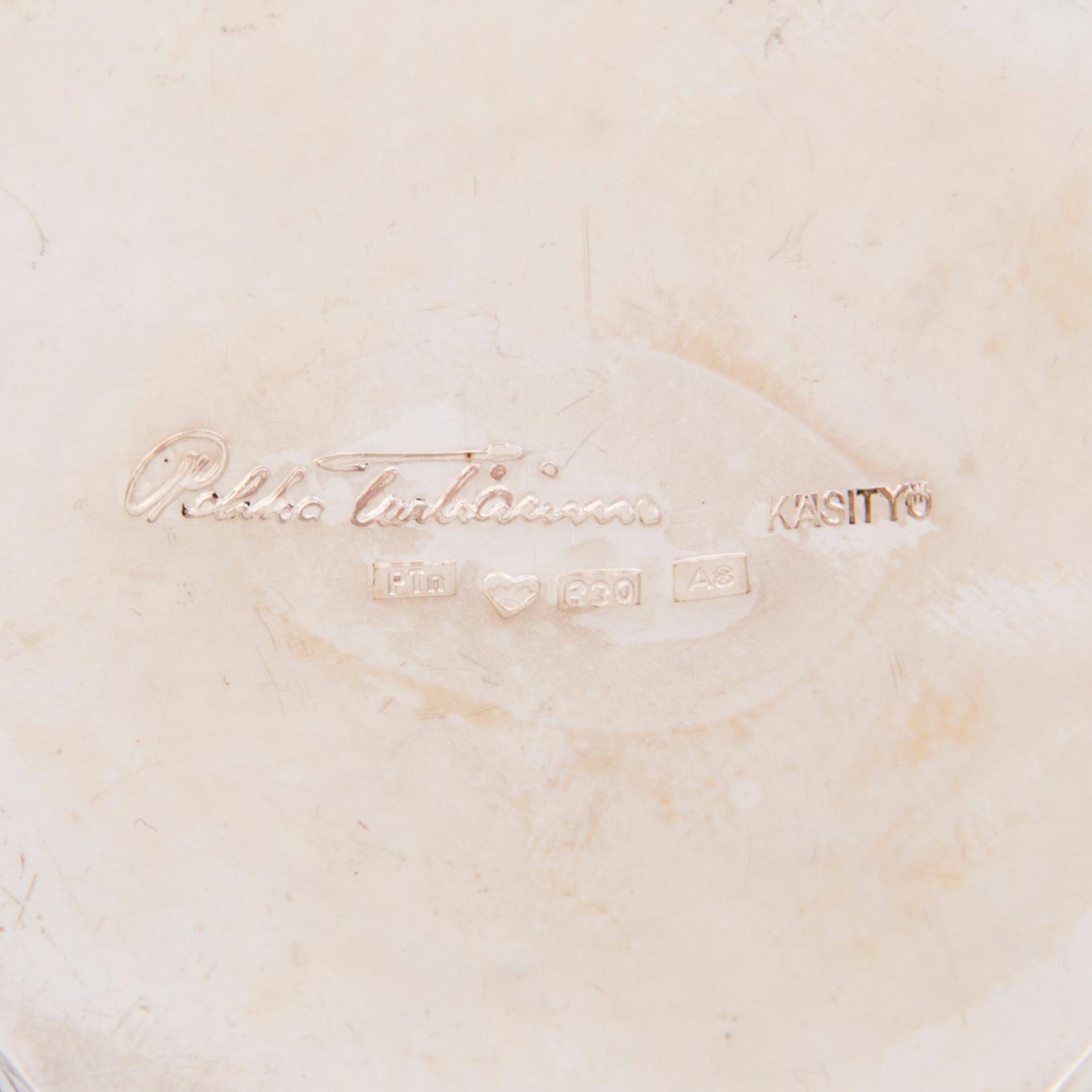 PEKKA TURTIAINEN, An 8-piece silver punch set, Helsinki 1978.