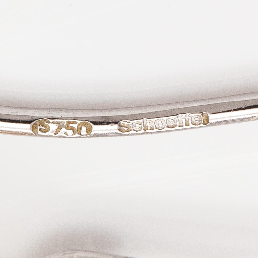 A pair of 18K white gold earrings with drop shaped cultured pearls. Schoeffel.