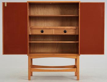 A Curt Blomberg mahogany cabinet, the doors, sides and top with painted panels, ca 1954.