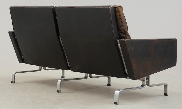 A Poul Kjaerholm 'PK-31-2' steel and black leather sofa, E Kold Christensen, Denmark.