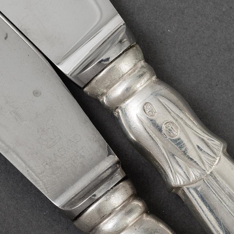 A set of 12 silver and steel knives, model Lotus, Denmark. 20th century.