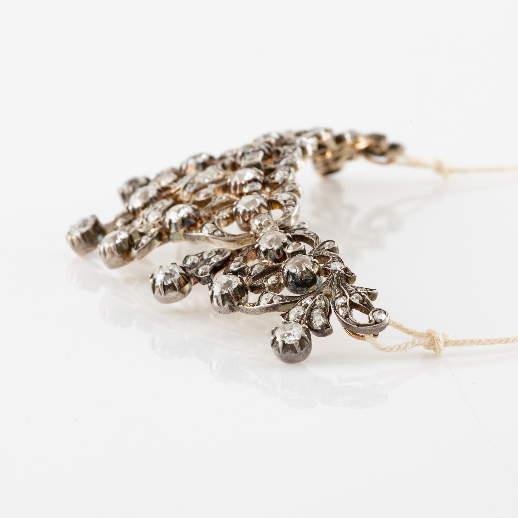 Tiara/brosch/collier, silver med gammalslipade och rosenslipade diamanter.