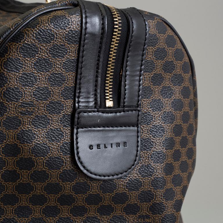 a CÉLINE weekend bag.
