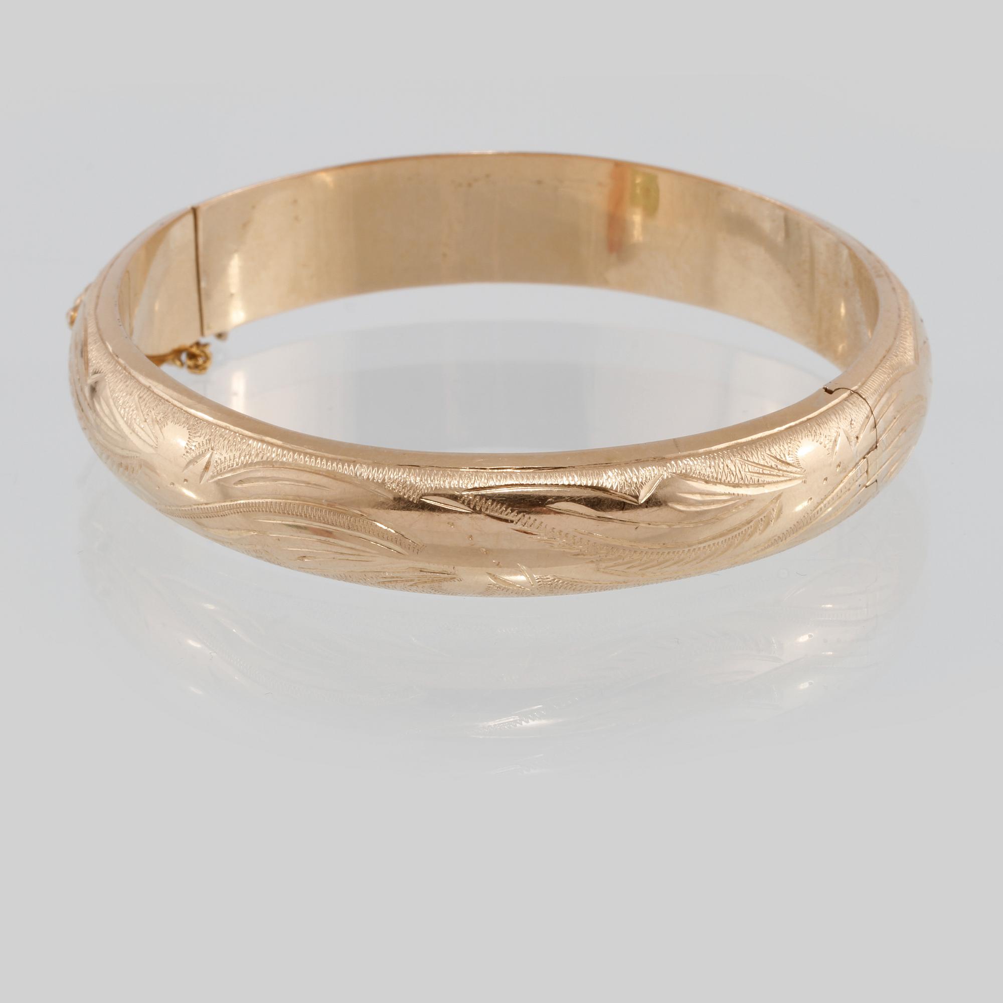 ARMRING, 18K guld, utländska stämplar. Vikt 28,5 gram.