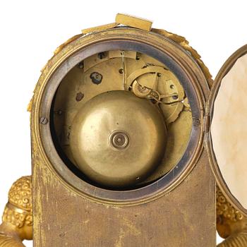 A French Empire ormolu mantel clock, early 19th century.