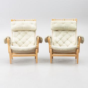 Bruno Mathsson, a pair of 'Pernilla' armchairs, Dux, Sweden, later part of the 20th century.
