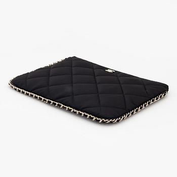 Chanel, a black satin clutch, 2021.