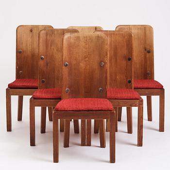 Axel Einar Hjorth, a set of 6 stained pine 'Lovö' dining chairs, Nordiska Kompaniet, Sweden 1930s.