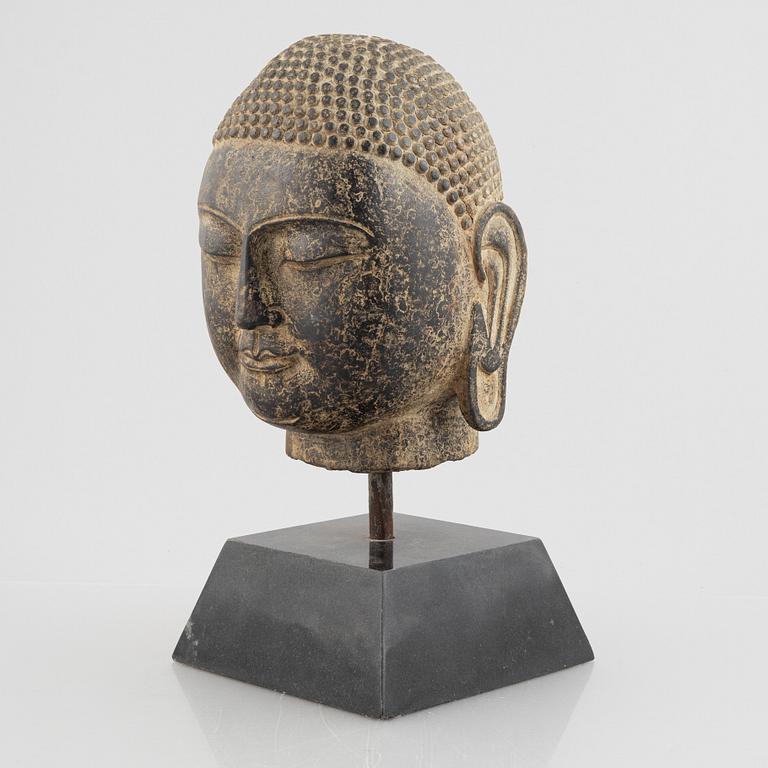 A Buddha's head, stone. Ming style.