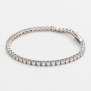 Tennis bracelet, brilliant cut diamonds, 18K white gold.