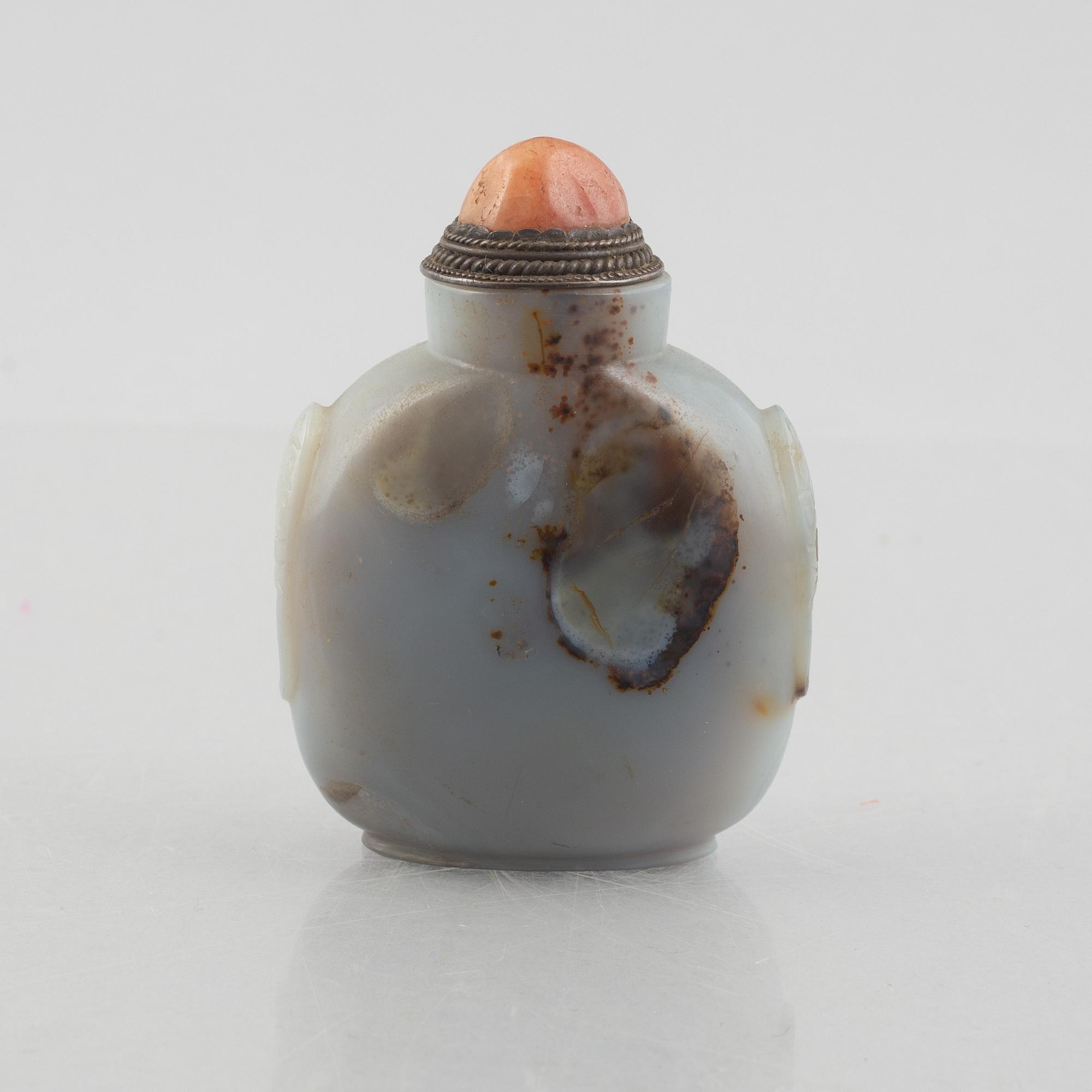 A group of three Chinese stone snuffbottles, 20th century.