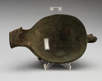 An archaistic tripod bronze vessel.
