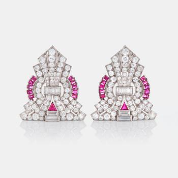 Two brooches/a double-clip set with round brilliant-, eight- and baguette-cut diamonds and rubies.