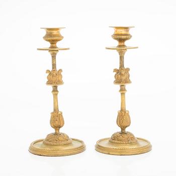 A pair of early 20th century candlesticks.