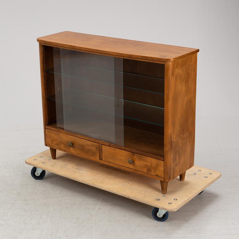 A Swedish Modern cabinet, 1940-50s.