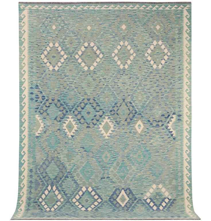 An Afghan kilim carpet, c. 299 x 213 cm.