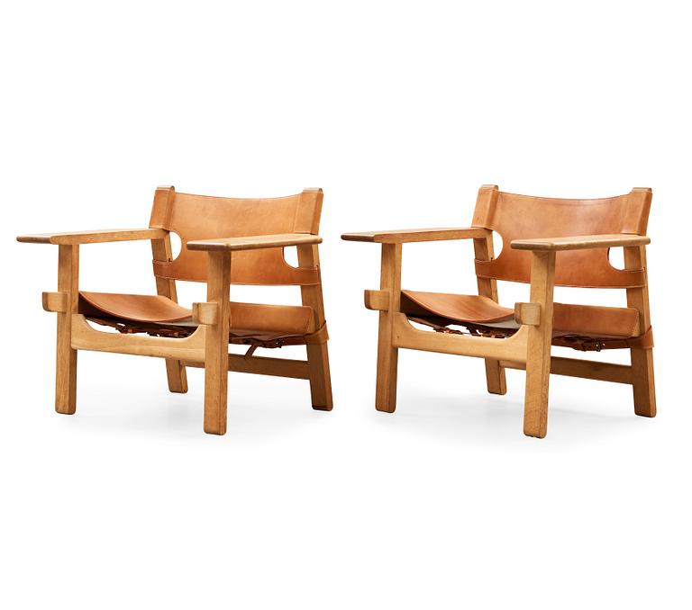 A pair of Børge Mogensen oak and leather 'Spanish Chair', Fredericia Stolefabrik, Denmark.