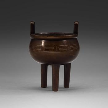 A bronze tripod censer, Qing dynasty, 19th Century with Xuandes six character mark.