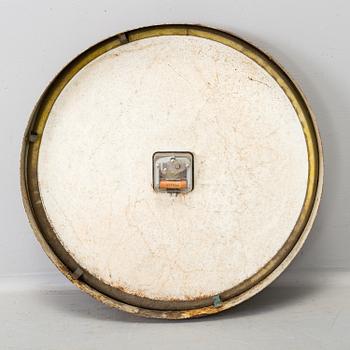 A METAL FRAMED WALL CLOCK, dial marked LM Ericsson, second half of the 20th century.