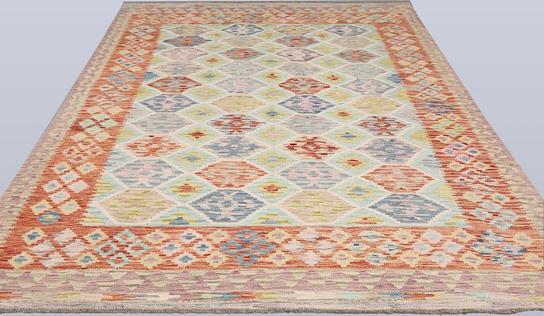 A Kilim carpet, approx. 309 x 203 cm.