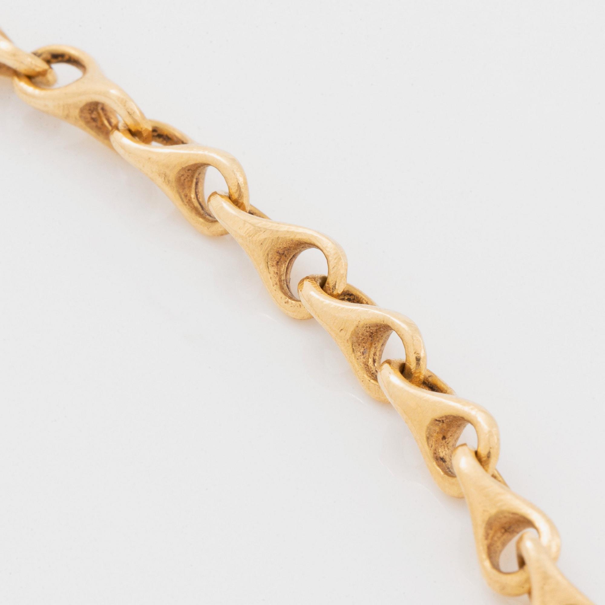 Ole Lynggaard collier med lås 18K guld.