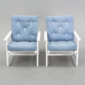 Elsa Stackelberg, a pair of painted aluminium armchairs, Fri Form, late 20th century.