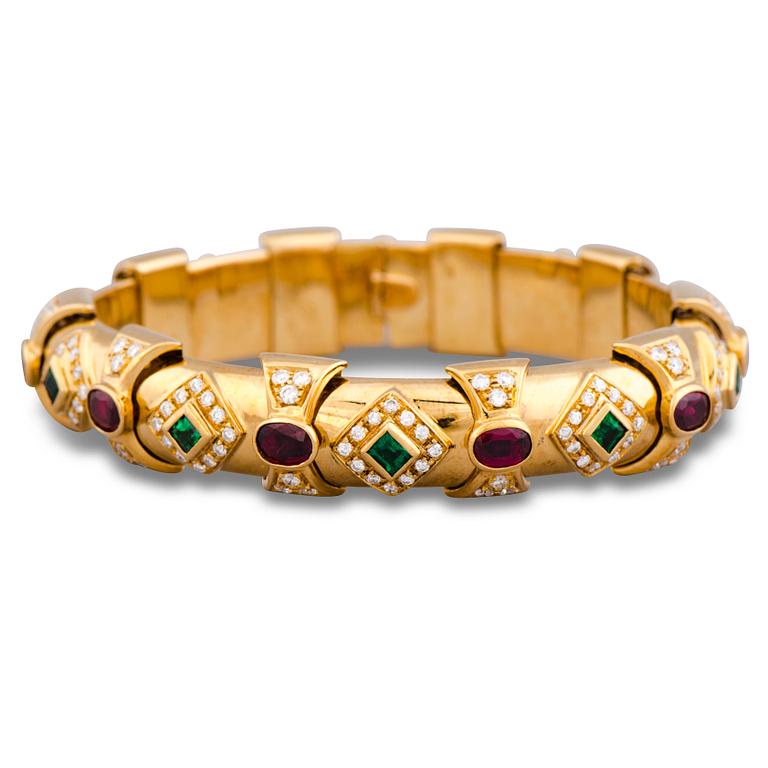 A BRACELET, facetted emeralds and rubies, brilliant cut diamonds, 18K gold.