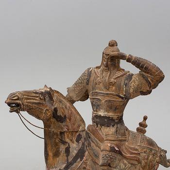 A large modern Chinese wooden sculpture.