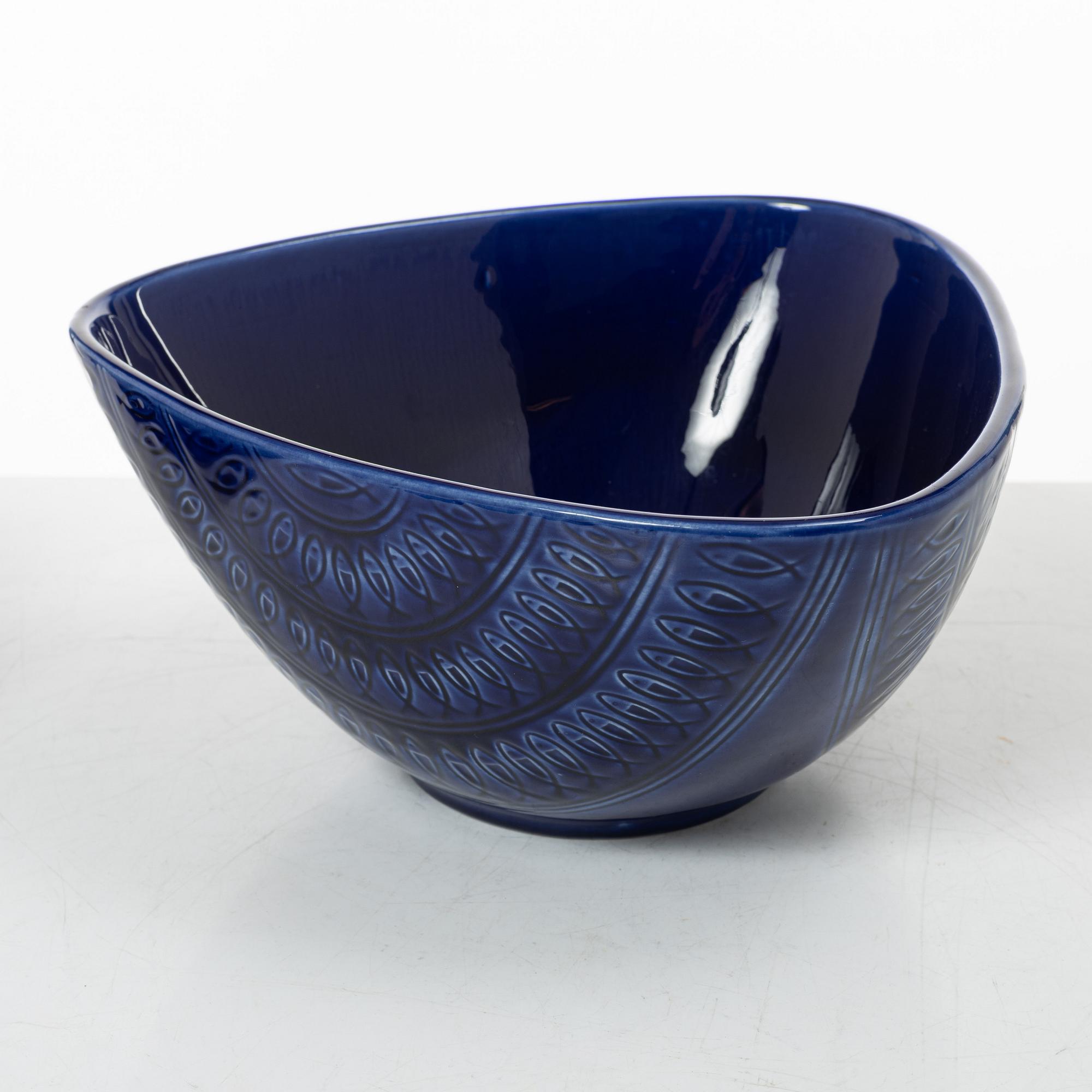 Hertha Bengtson, a stoneware bowl and twelve plates, Rörstrand, Sweden.