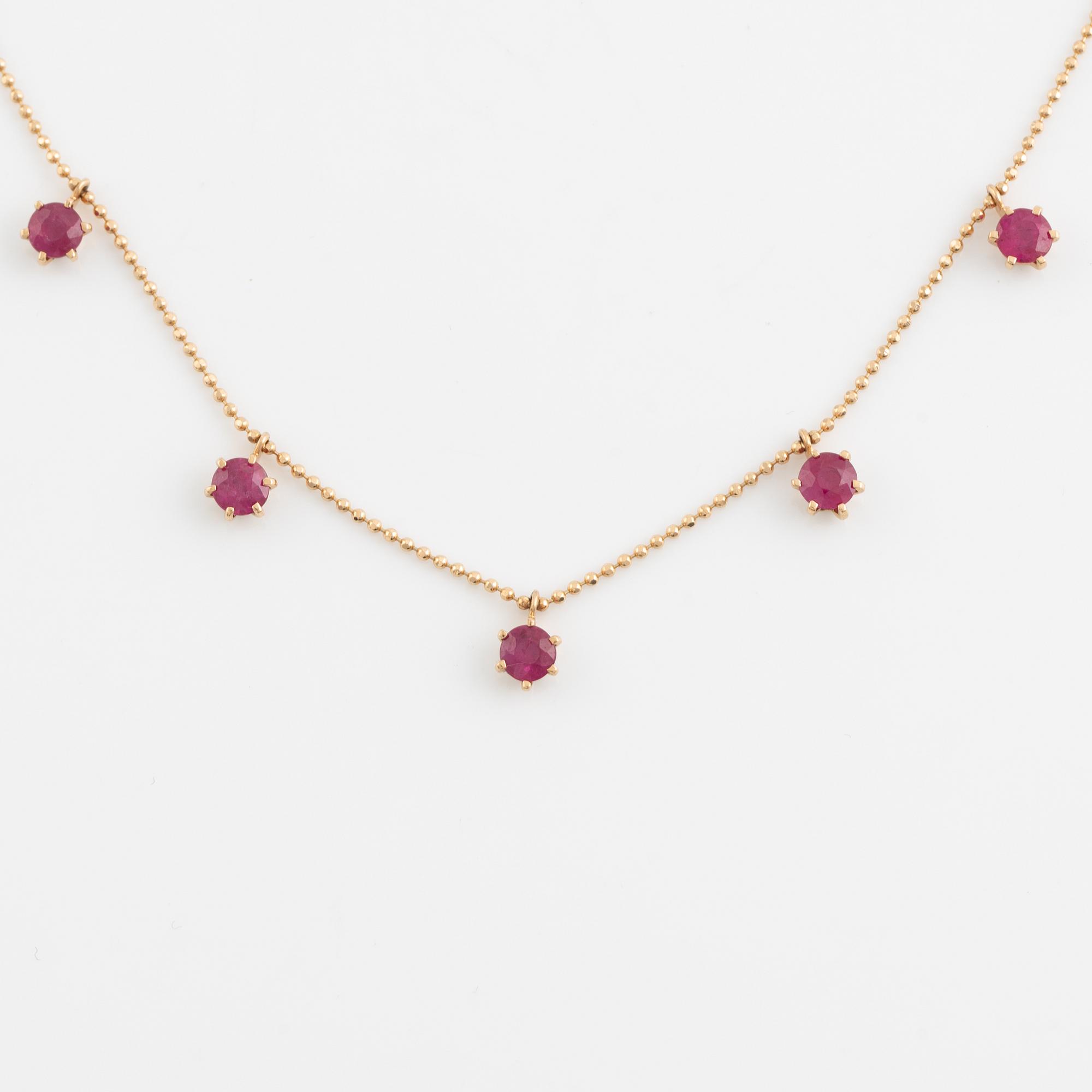 Collier guld med rubiner.