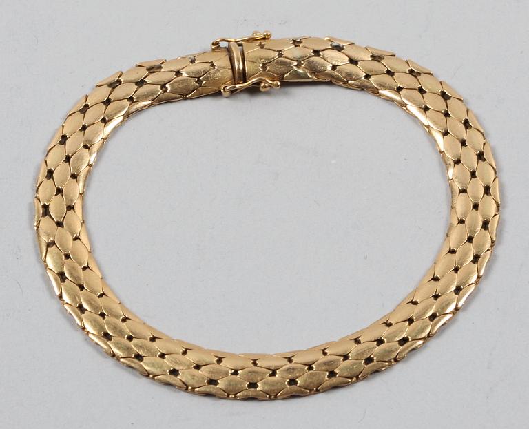 ARMBAND, 18K guld, 19 gram.