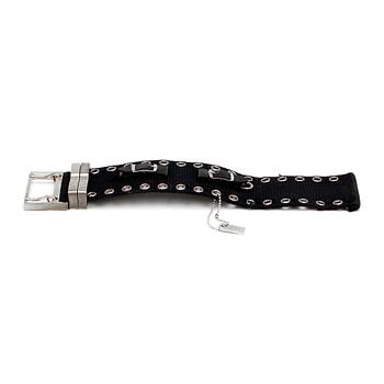 CHRISTIAN DIOR, a black cotton and silver colored metal bracelet.