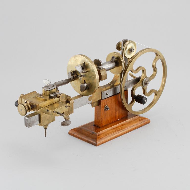 A hand powered lathe for watchmakers by R Flume in Berlin, 19th century.