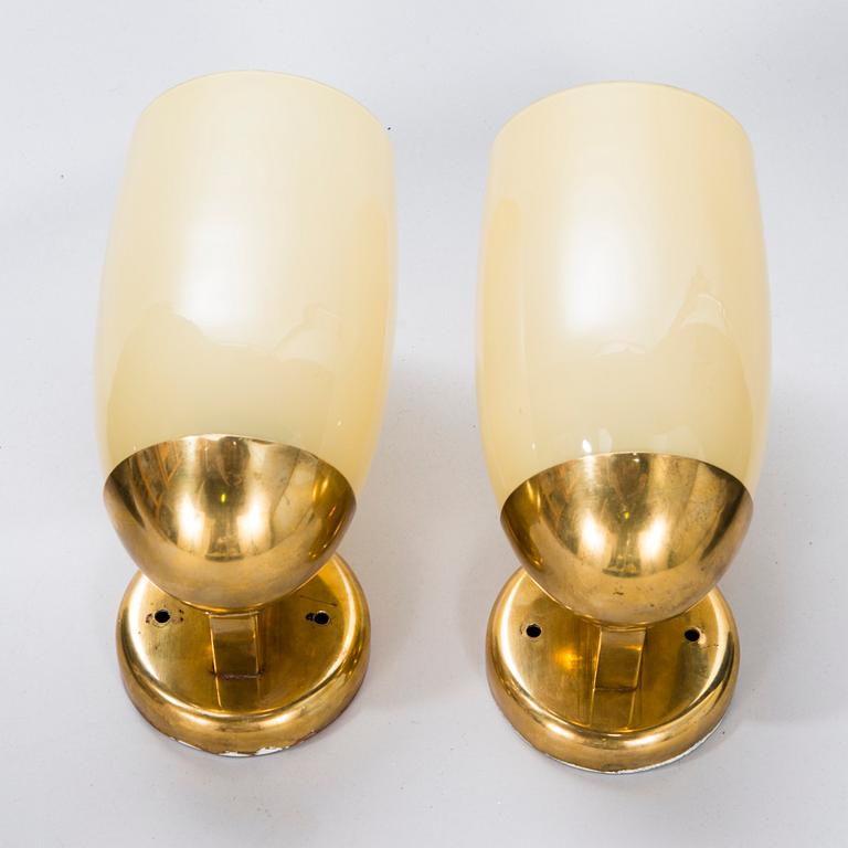 PAAVO TYNELL, a pair of mid 20th century wall lights for Idman. Finland.