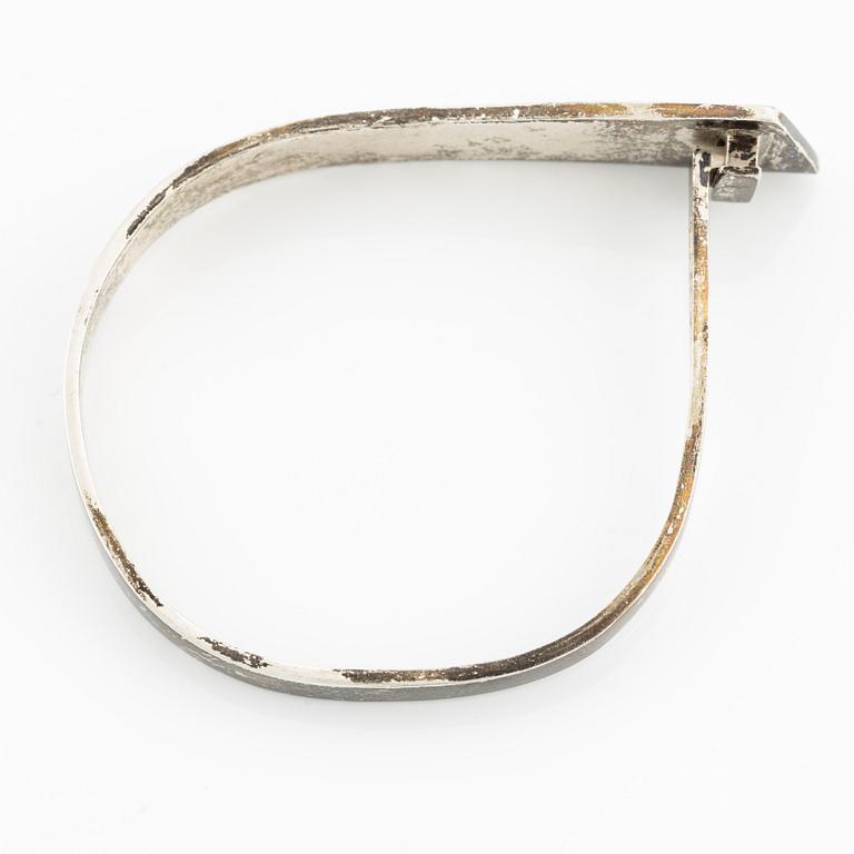 Rey Urban,  silver bangle.