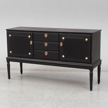 A mid 20th century painted sideboard.