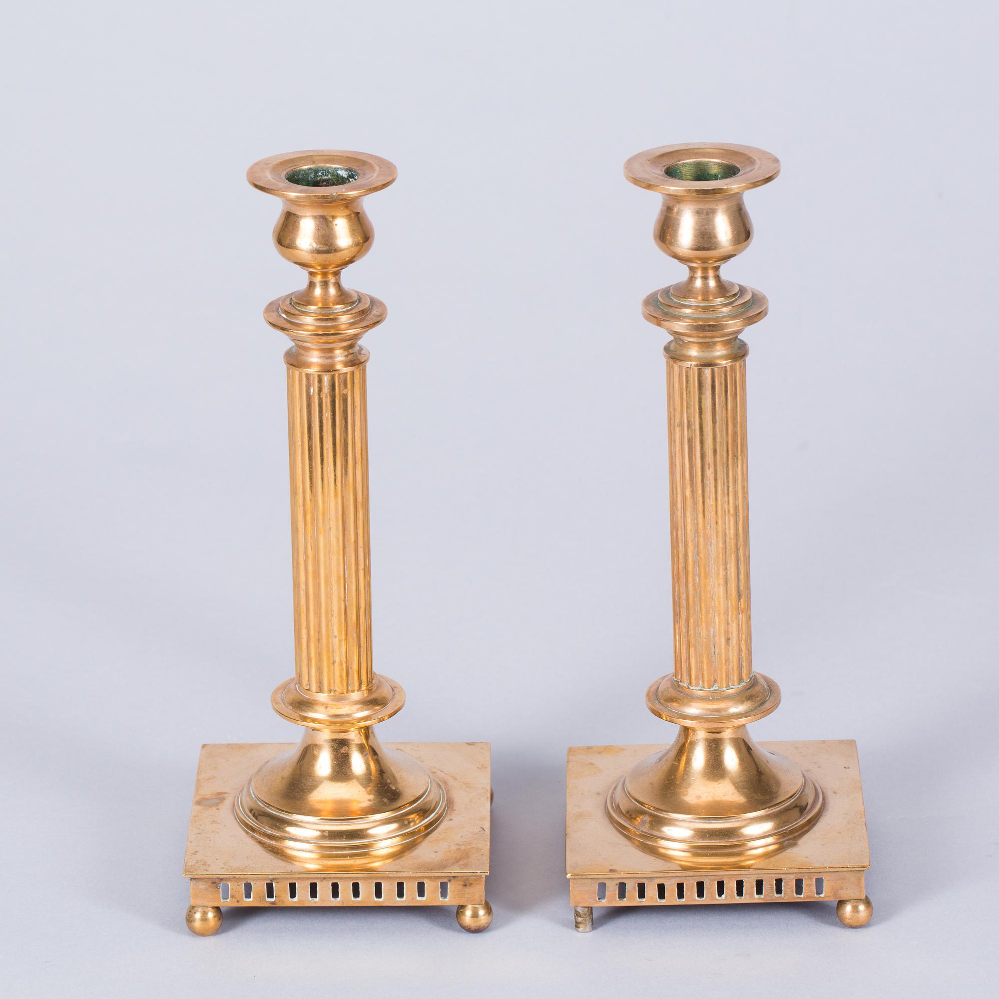 KOLONNLJUSSTAKAR, ett par, mässing, Jönköping.